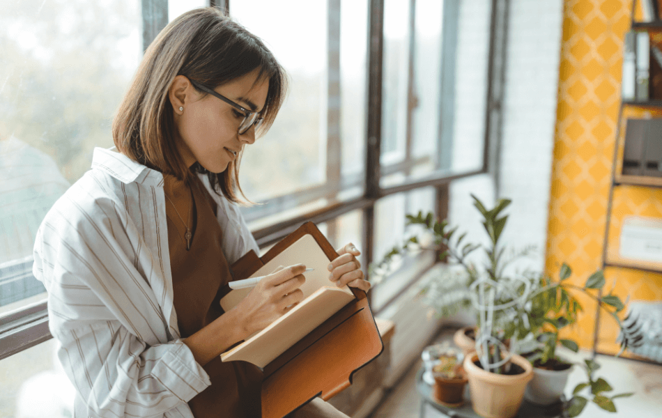 Person writing in a journal